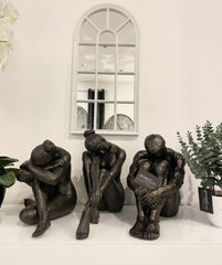 Bronze Colour Sitting Statues